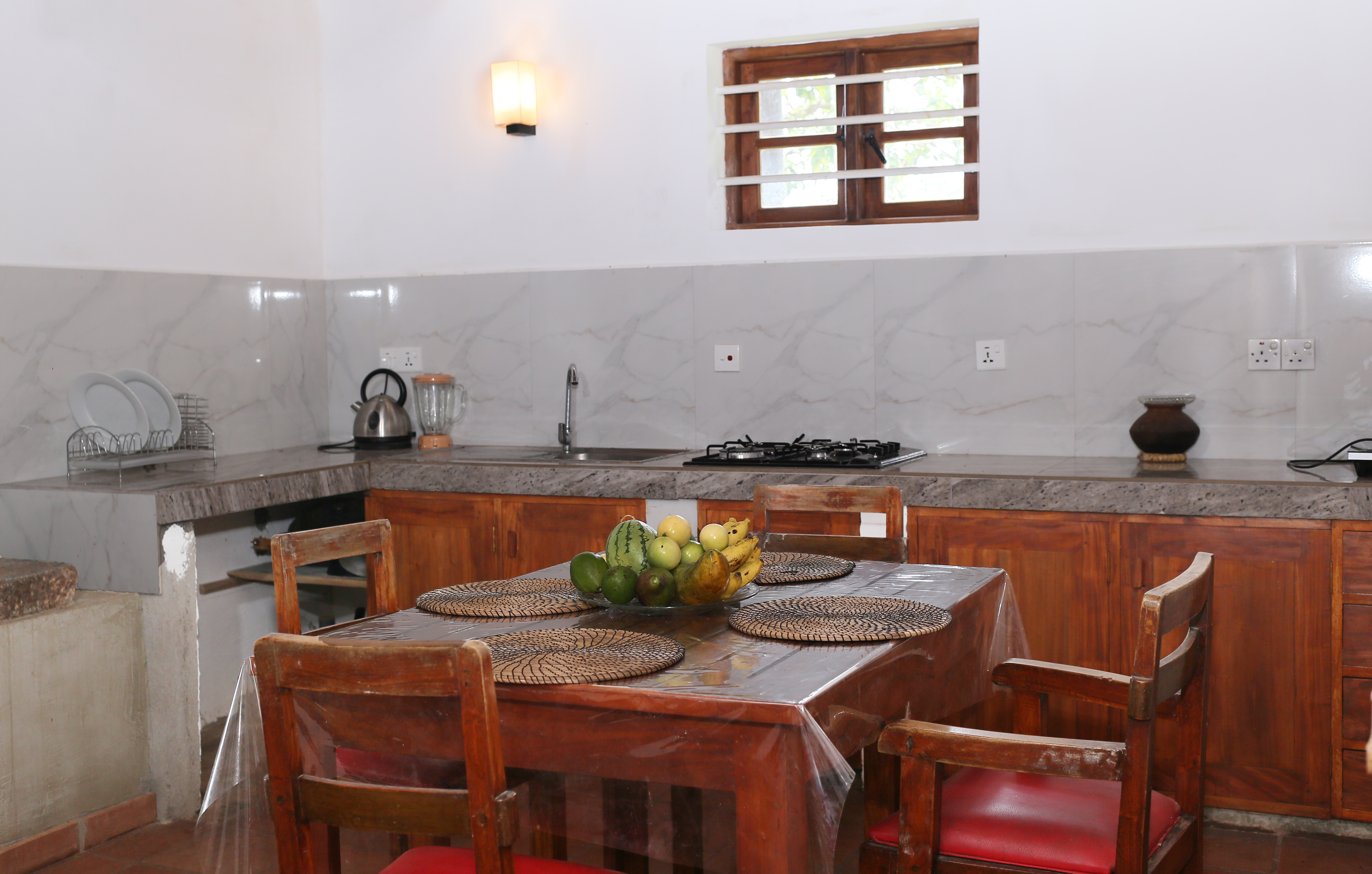 Modern kitchen with all amenities at Lion Shade Tourist Bungalow